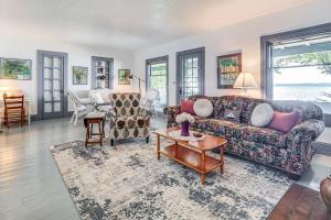 Torch Lake Getaway with Private Beach and Boat Dock!