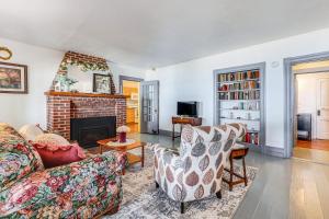 Torch Lake Getaway with Private Beach and Boat Dock!