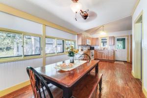 Torch Lake Getaway with Private Beach and Boat Dock!