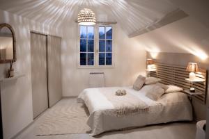 Maisons de vacances Muraille du chateau avec jacuzzi : photos des chambres