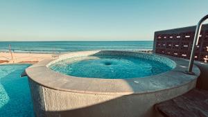 Oceanfront Living & Surfing in Cabo Paradisiacal 2BR Condo