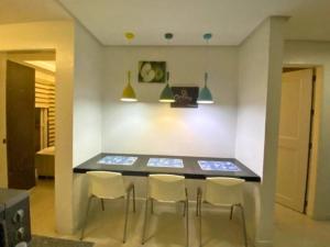 40 Percent Promo Off This Month, Balcony Ocean View Plus Free Pool & Sauna Access Exclusive 2025 Rates at Walking Distance US Embassy, Front of Robinsons Place MANILA, Bellagio and Experience Breathtaking Manila Bay Views