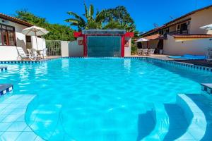 Condominio com piscina e ótima localização.