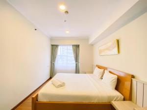 2BR Spacious Sudirman Tower Condominium Apartment Semanggi By Travelio