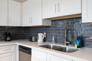 Modern 2BR Escape with Pool & Free Parking