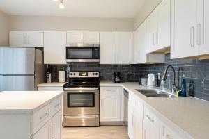 Modern 2BR Escape with Pool & Free Parking