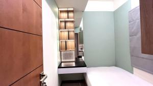 Warm and Homey 2BR at Vida View Makassar Apartment By Travelio