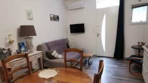 Maisons de vacances Les Gites sous l' Olivier en Camargue : photos des chambres