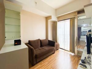 Signature 2BR at Apartment Tamansari Panoramic By Travelio
