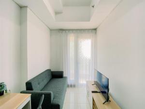 Comfortable and Homey 1BR Boutique Kemayoran Apartment By Travelio