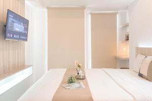 Simply Studio Apartment at Tokyo Riverside PIK 2 By Travelio