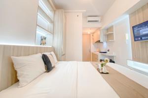 Simply Studio Apartment at Tokyo Riverside PIK 2 By Travelio