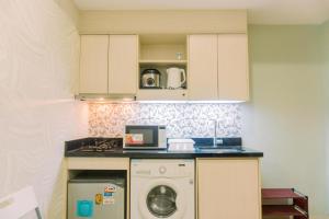 Cozy 1BR at The Mansion Kemayoran Apartment By Travelio
