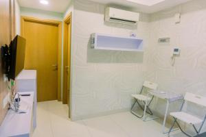 Cozy 1BR at The Mansion Kemayoran Apartment By Travelio