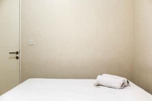 Spacious and Nice 2BR at Springlake Summarecon Bekasi Apartment By Travelio
