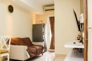 Spacious and Nice 2BR at Springlake Summarecon Bekasi Apartment By Travelio