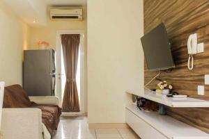 Spacious and Nice 2BR at Springlake Summarecon Bekasi Apartment By Travelio