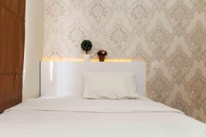 Spacious and Nice 2BR at Springlake Summarecon Bekasi Apartment By Travelio