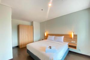 Spacious 2BR Apartment at El Royale near BIP By Travelio