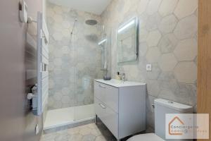 Appartements Agreable Maisonnette a Proximite d-Eurexpo : photos des chambres