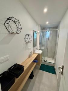 Appartements La Madeleine avec parking : photos des chambres
