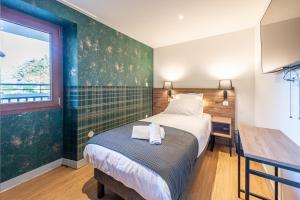 Appartements Les Tonnelles : photos des chambres