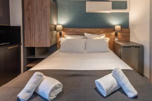 Appartements Les Tonnelles : photos des chambres