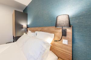 Appartements Les Tonnelles : photos des chambres