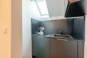 Appartements Les Tonnelles : photos des chambres