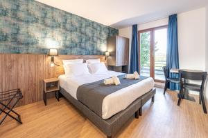 Appartements Les Tonnelles : photos des chambres