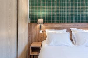 Appartements Les Tonnelles : photos des chambres