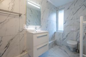 Appartements Les Tonnelles : photos des chambres