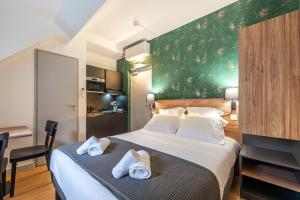 Appartements Les Tonnelles : photos des chambres