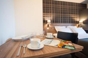 Appartements Les Tonnelles : photos des chambres