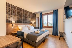 Appartements Les Tonnelles : photos des chambres