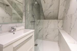 Appartements Les Tonnelles : photos des chambres