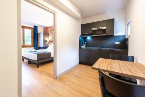 Appartements Les Tonnelles : photos des chambres