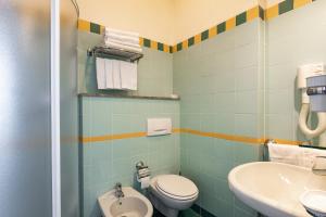 Quadruple Room with Lateral Sea View room in Hotel Palos