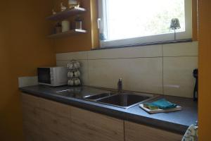 Couette et fourchette-Gite-Jacuzzi et jardin à Maredsous