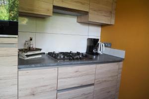 Couette et fourchette-Gite-Jacuzzi et jardin à Maredsous