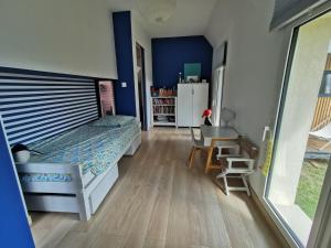 Maisons de vacances Maison front de mer - plage du debarquement : photos des chambres