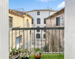 Maisons de vacances Maison charmante clim et balcon en centre ville : photos des chambres