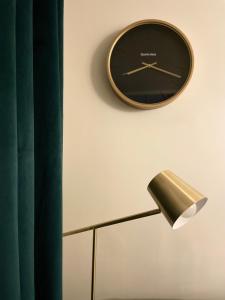 Appartements Studio avec climatisation et parking : photos des chambres