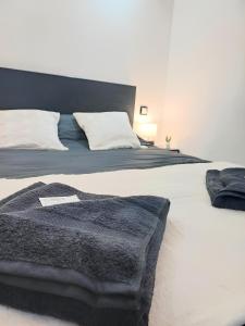 Appartements Le Quantum Room - Avec Netflix et Amazon Prime : photos des chambres