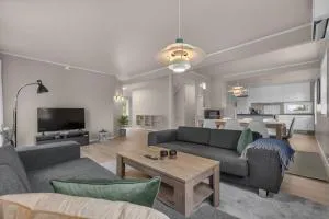 Stort hus med mange soverom sentralt i Tromsø - Tomasjorda