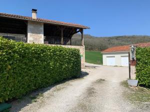 Maisons de vacances Maison de charme a Saint-Gery avec piscine partagee : photos des chambres