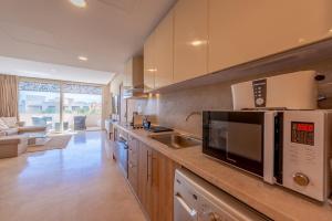 Coastal Vibe 2BR Mangroovy Gouna with Rooftop Cinema, BBQ, Pool & Beach Access