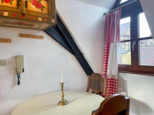 Appartements La Maison Bleue - Historic House in the Heart of Riquewihr : photos des chambres