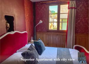 Appartements La Maison Bleue - Historic House in the Heart of Riquewihr : photos des chambres