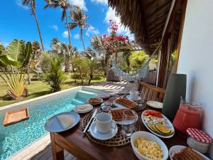 Tiki Pools Bungalows